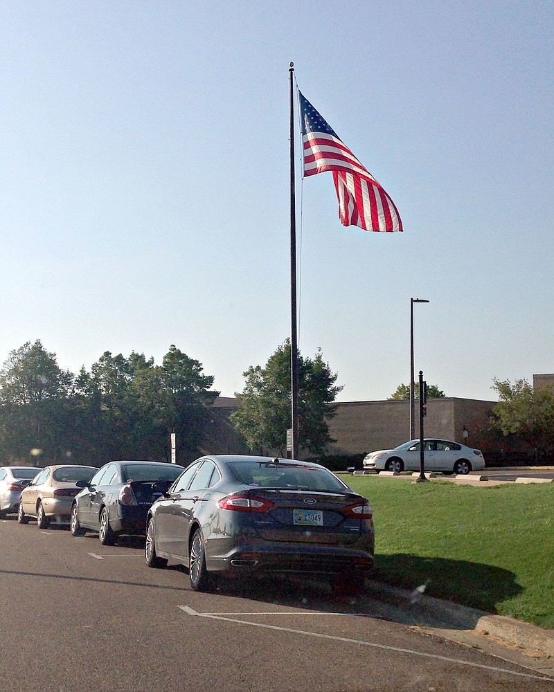 An enlarged American flag is now the only flag that flies outside the Wise Center at Mississippi State University in Starkville, Miss., Tuesday, Aug. 30, 2016. The Mississippi state flag no longer flies at the Wise Center or any other exterior location on campus says the university's Chief Communications Officer Sid Salter. 