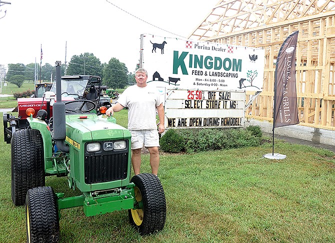 Darrel Wilmsmeyer, owner of Kingdom Feed Services, stands in front of his business Wednesday afternoon.