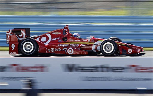 Scott Dixon, of New Zealand, drives during during practice for Sunday's IndyCar Grand Prix at The Glen auto race Friday, Sept. 2, 2016, in Watkins Glen, N.Y.