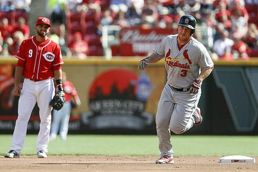 St. Louis Cardinals' Jedd Gyorko (3) runs the bases after hitting a solo home run off Cincinnati Reds starting pitcher Dan Straily in the first inning of a baseball game, Saturday, Sept. 3, 2016, in Cincinnati. 