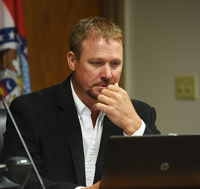 In this June 21, 2016 file photo, Cole County's Eastern District Commissioner Jeff Hoelscher listens to residents as they address him and other commissioners during a public meeting. 