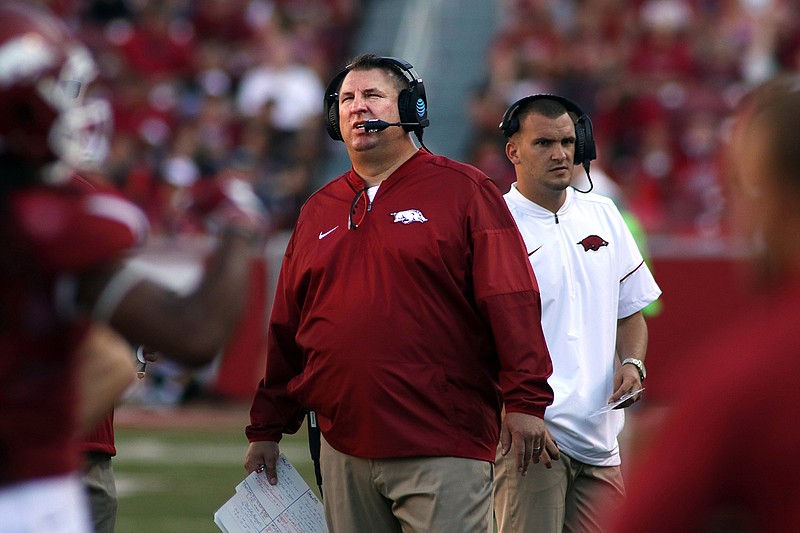 Arkansas head coach Bret Bielema watches a replay on the scoreboard during the fourth quarter of an NCAA college football game against Louisiana Tech, Saturday, Sept. 3, 2016, in Fayetteville, Ark. Arkansas defeated Louisiana Tech, 21-20. 