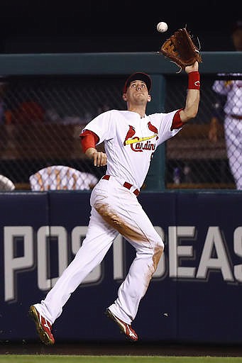 St. Louis Cardinals right fielder Stephen Piscotty catches a fly ball hit by Milwaukee Brewers' Orlando Arcia during the sixth inning of a baseball game, Thursday, Sept. 8, 2016, in St. Louis.