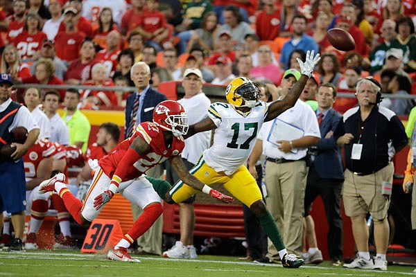 Packers wide receiver Davante Adams (right) is unable to reach a pass while being defended by Chiefs defensive back Kenneth Acker (left) during the first half of a Sept. 1 preseason game in Kansas City.