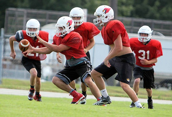 The Tipton Cardinals secure an onside kick during drills at recent practice.