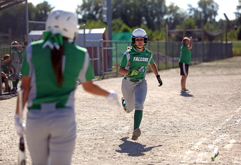 Sydney Wilde of Blair Oaks heads for the plate during the Falcons' game against Fox on Saturday, Sept. 10, 2016 in the Capital City Invitational at 63 Diamonds.