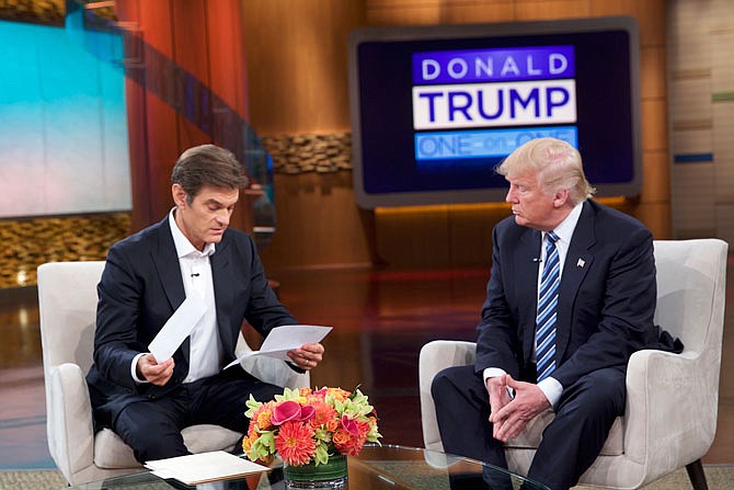 This image released by Sony Pictures Entertainment shows Dr. Oz, left, and Republican presidential candidate Donald Trump during a taping of "The Dr. Oz Show," in New York. The show will air today.