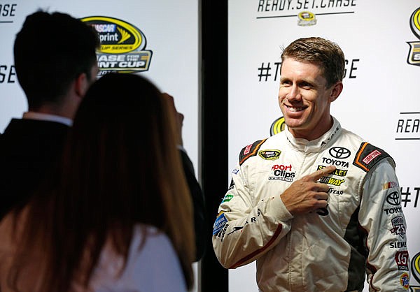 Carl Edwards smiles during the NASCAR Sprint Cup media day Thursday in Chicago.