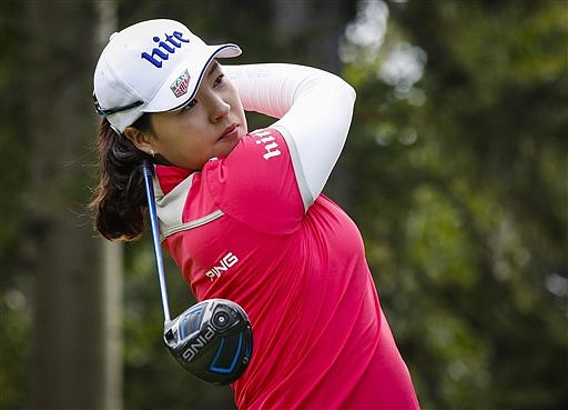 South Korea's In Gee Chun hits a tee shot during the first round of the LPGA's Canadian Open golf tournament in Priddis, Alberta, Thursday, Aug. 25, 2016.