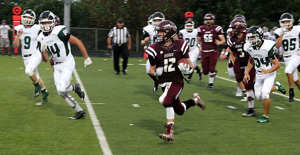 School of the Osage junior running back Ian Riley closes in on the end zone during last Friday night's conference game against Warsaw.