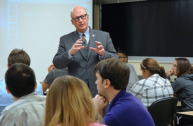 R.E. Burnett, an expert on science and technology's influence on national defense, speaks to students Wednesday at Westminster College's Hancock Symposium.