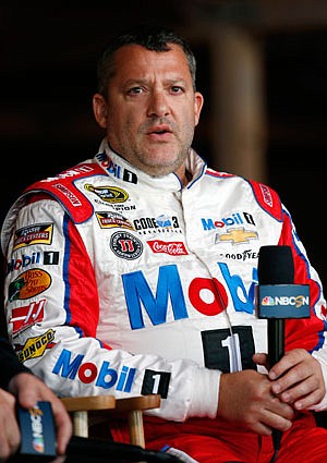 Tony Stewart talks during media day Thursday in Chicago. The 16 drivers in the Chase for the Sprint Cup championship took part in the event.