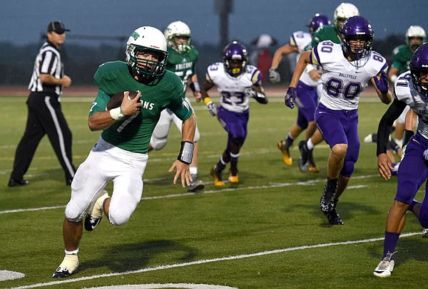 Jake Van Rozelen of Blair Oaks breaks away for a touchdown during Friday night's game against Hallsville at the Falcon Athletic Complex in Wardsville.