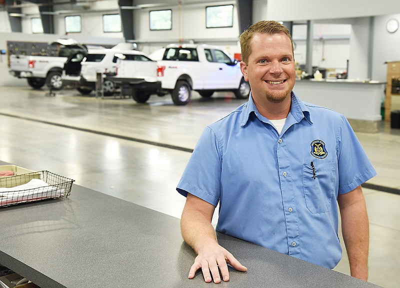 Brad Adams, superintendent of the Missouri Highway Patrol garage, poses in the newly rebuilt facility behind Troop F headquarters in Jefferson City.