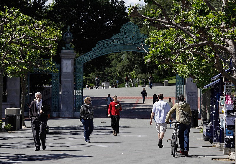 In this June 1, 2011, file photo, people walk through Sproul Plaza near the Sather Gate on the University of California, Berkeley campus in Berkeley, Calif. The university suspended a class on Sept. 13, 2016, amid complaints that it shared anti-Semitic viewpoints and was designed to indoctrinate students against Israel.