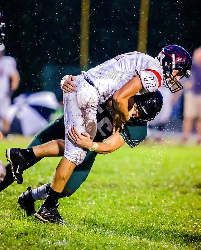 North Callaway junior linebacker Tanner Pezold sacks Clopton/Elsberry senior quarterback Stephen Talbert during the Thunderbirds' 20-6 EMO victory over the IndianHawks on Friday night, Sept. 16, 2016 in Kingdom City, Mo.