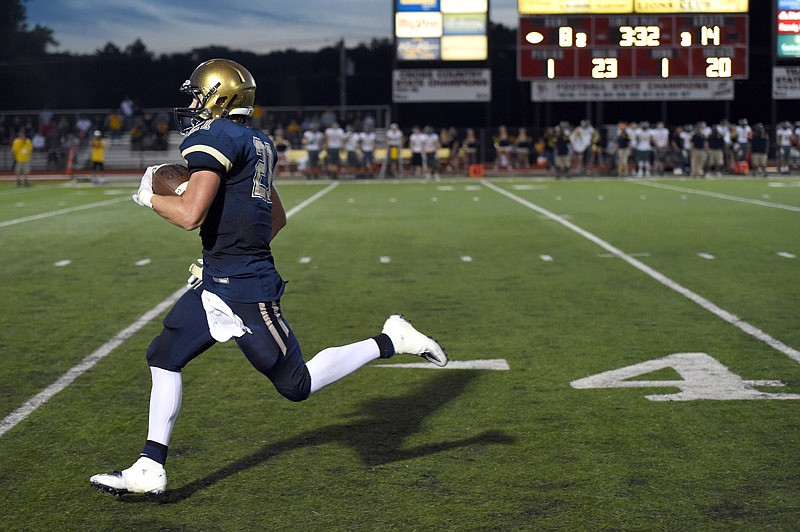 Jacob Storms of Helias runs for a touchdown against Battle in their football game Saturday, Sept. 17, 2016 at Adkins Stadium in Jefferson City.