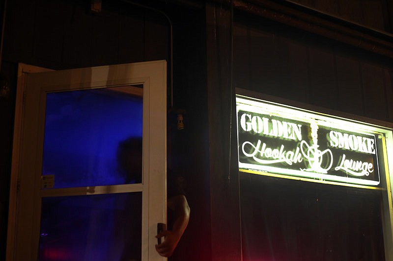 An unidentified patron enters the Golden Smoke Hookah Lounge, located at the corner of East High and Lafayette streets in Jefferson City. (Sept. 15, 2016 file photo)
