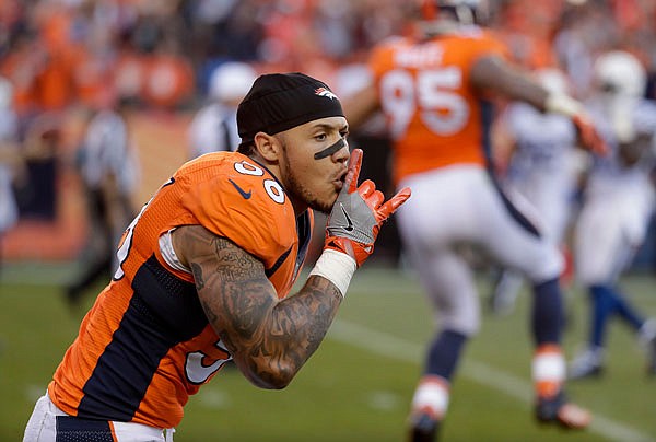 (At right) Broncos linebacker Shane Ray celebrates after scoring during the second half of Sunday afternoon's game against the Colts in Denver.