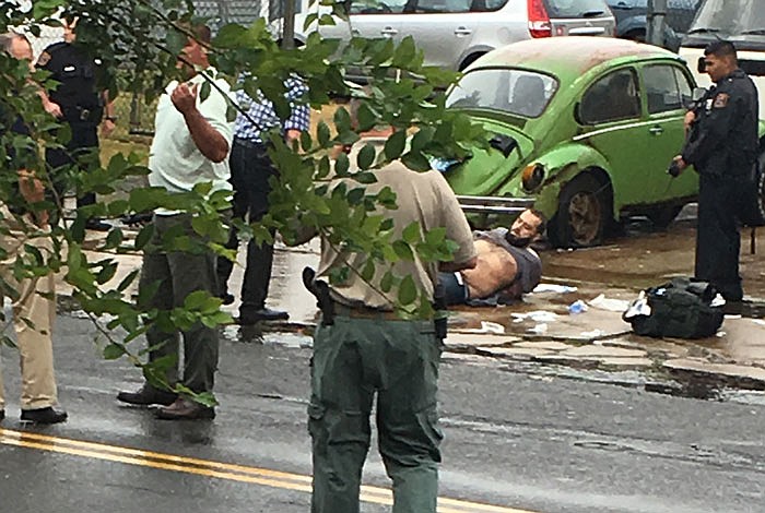 Ahmad Khan Rahami is taken into custody after a shootout with police Monday in Linden, New Jersey. Rahami was wanted for questioning in the bombings that rocked the Chelsea neighborhood of New York and the New Jersey shore town of Seaside Park.