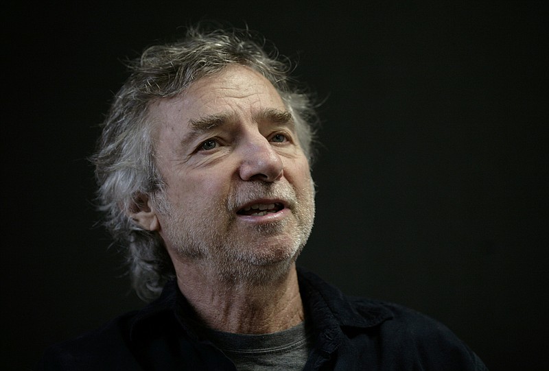 In this Dec. 1, 2009 file photo, U.S. filmmaker Curtis Hanson, speaks during an interview at the International Book Fair in Guadalajara, Mexico. Hanson, who won an Oscar for the screenplay for "L.A. Confidential" and directed Eminem in the movie "8 Mile," has died. Los Angeles police say paramedics called to Hanson's Hollywood Hills home found him dead Tuesday, Sept. 20, 2016. He was 71.