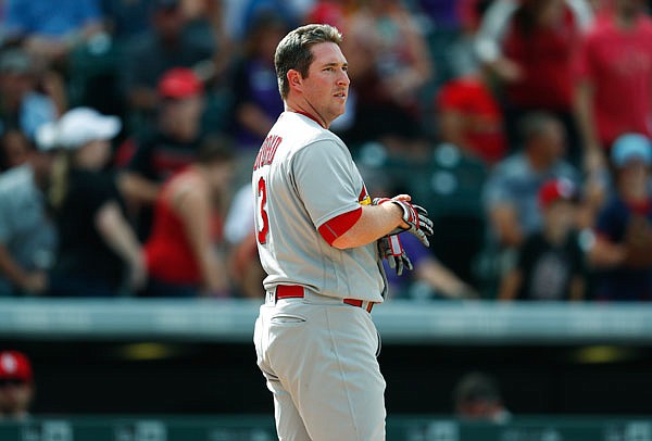 Jedd Gyorko of the Cardinals reacts after striking out against Rockies relief pitcher Chris Rusin to end the top of the seventh inning of Wednesday's game in Denver. 