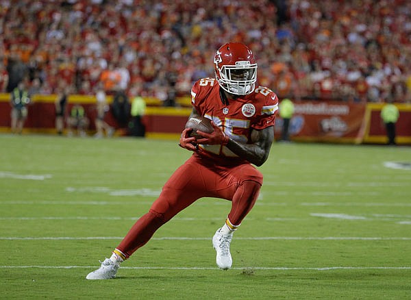 In this Sept. 17, 2015, file photo, Chiefs running back Jamaal Charles runs with the ball during the first half of a game against the Broncos in Kansas City. Charles could play Sunday against the Jets after missing the first two weeks of the season.