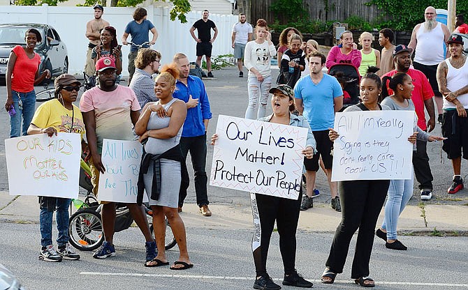 Demonstrators protest police treatment of a 15-year-old girl who was pepper-sprayed during an arrest Wednesday in Hagerstown, Maryland. 