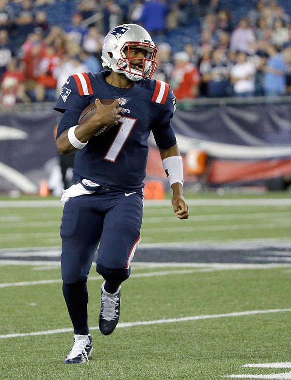 Patriots quarterback Jacoby Brissett runs against the Texans during the second half of Thursday night's game in Foxborough, Mass. 