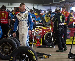 Carl Edwards waits for his car before Friday's practice at New Hampshire Motor Speedway in Loudon, N.H. 