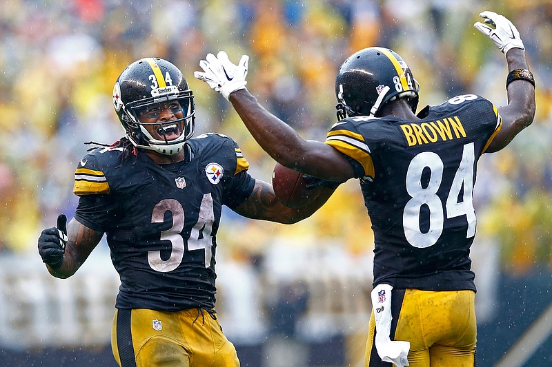 In this Sunday, Sept. 18, 2016, file photo, Pittsburgh Steelers running back DeAngelo Williams (34) celebrates his touchdown with wide receiver Antonio Brown (84) during the second half of an NFL football game against the Cincinnati Bengals in Pittsburgh. Williams leads the NFL in rushing in his 11th pro season, Brown is the game's most dangerous wideout, and Ben Roethlisberger is making big plays.