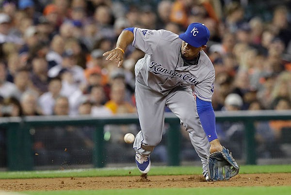 Royals third baseman Cheslor Cuthbert fields the ball hit by J.D. Martinez of the Tigers during the third inning of Friday night's game in Detroit.