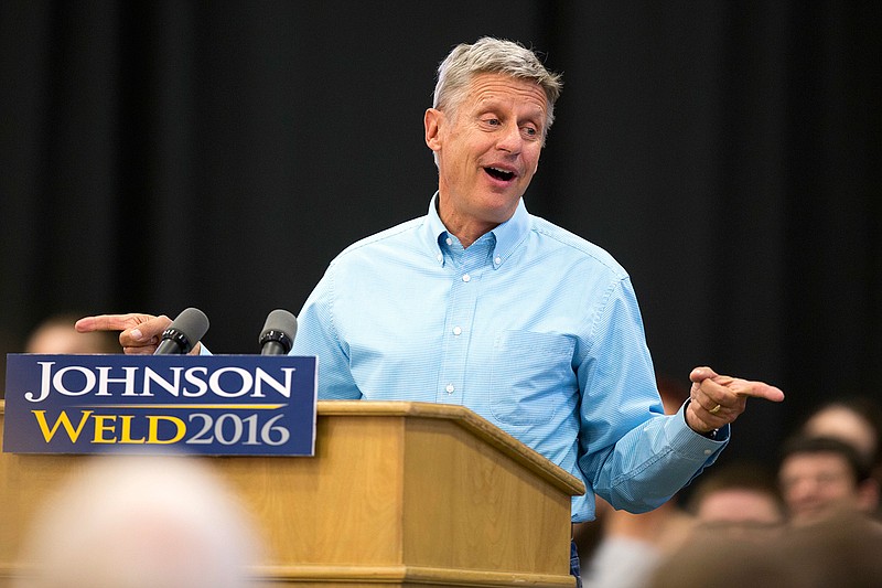 In this Sept. 3, 2016 file photo, Libertarian presidential candidate Gary Johnson speaks during a campaign rally in Des Moines, Iowa. Most presidential hopefuls usually spend their Septembers in places like Ohio and Florida, hoping to win over a handful of swing voters in battleground states. But Johnson is crisscrossing the country in a desperate, last-ditch attempt to boost his national poll numbers and qualify for the presidential debates.