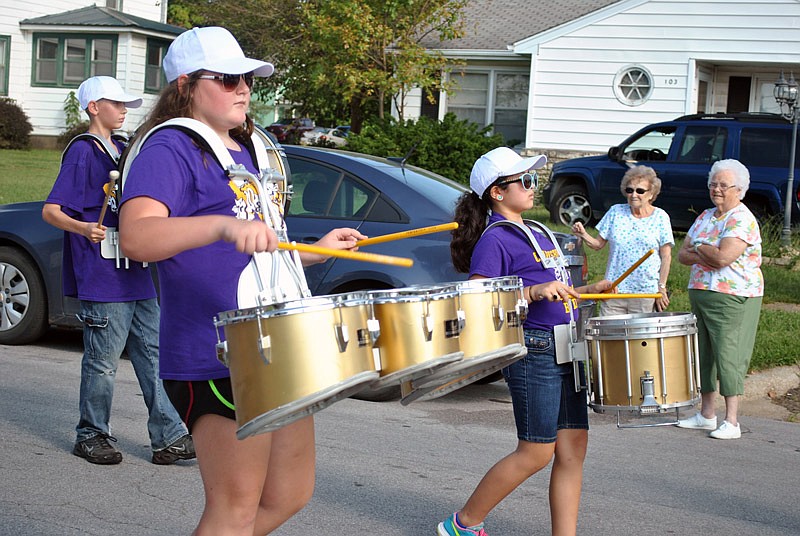 The Clarksburg Bulldog Band drum corps kept cadence as they marched in the Eldon Turkey Festival Parade Saturday, Sept. 24, 2016.