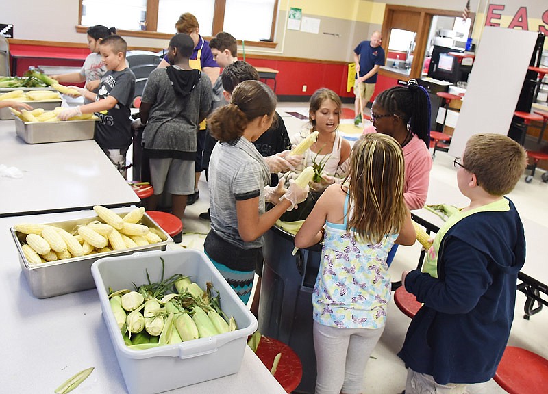 Fifth-grade students at Jefferson City's East Elementary School are finding out more about where their food comes from as the school is utilizing more local produce. On a recent day after lunch, these students shucked dozens of ears of corn that would be served at lunch the next day.