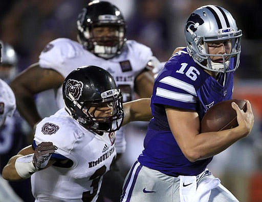 Kansas State quarterback Jesse Ertz (16) gets tackled by Missouri State linebacker Dylan Cole (31) after a 35-yard run during the first half of an NCAA college football game in Manhattan, Kan., Saturday, Sept. 24, 2016.