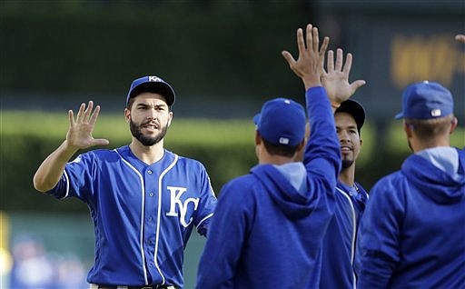 Kansas City Royals' Eric Hosmer greets teammates after their 7-4 win over the Detroit Tigers in a baseball game, Saturday, Sept. 24, 2016, in Detroit.