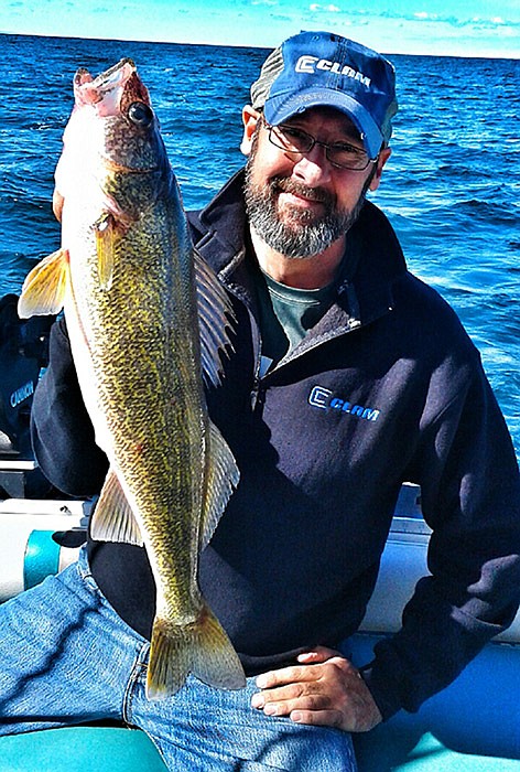 Dan Stefanich shows off a walleye caught at Lake Erie.