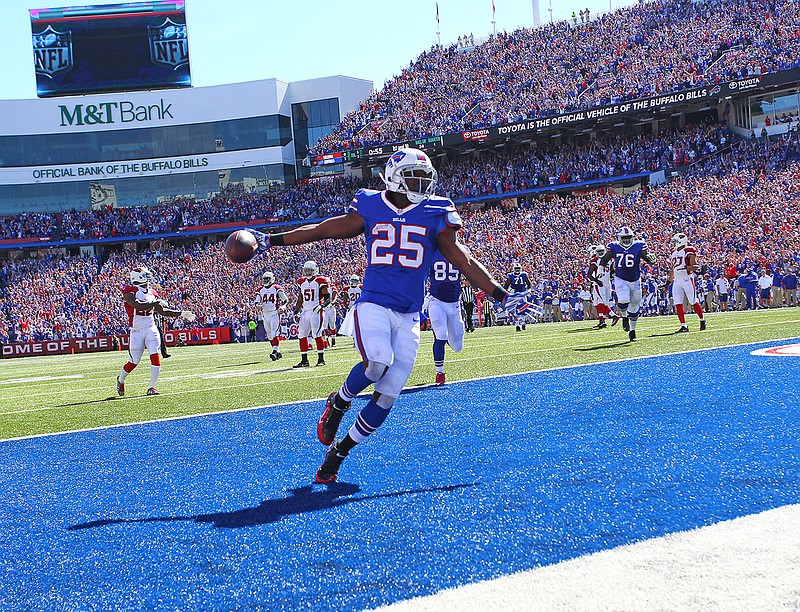 Buffalo Bills running back LeSean McCoy (25) scores a rushing touchdown during the first half of an NFL football game against the Arizona Cardinals, Sunday, Sept. 25, 2016, in Orchard Park, N.Y. 