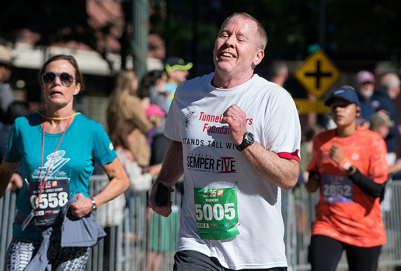 Robert Schenk, of Brick N.J., nears the finish line during the "Stephen Siller Tunnel to Towers" memorial event in New York, Sunday, Sept. 25 2016. The sponsors of the run honoring New York firefighter Stephen Siller, who died at the World Trade Center on Sept. 11, 2001, invited participants, including Schenk, of the Seaside, N.J., Semper Five Marine Corps charity run that was cancelled last week after a pipe bomb exploded along the route.