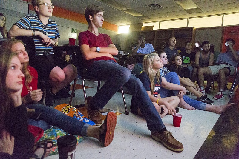 Texas High School's Young Democrats and Young Republicans watch the first debate between Hillary Clinton and Donald Trump on Monday at the school. The event was hosted by both student clubs and filled THS teacher Hunter Davis' classroom to capacity. 