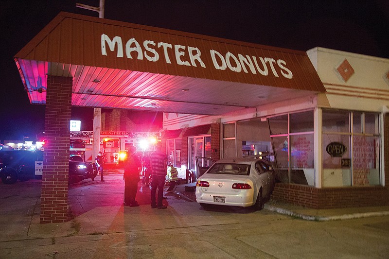 A white Buick sedan crashed through the front window of Master Donuts on Monday at the corner of Robison and New Boston roads. The store was closed.
