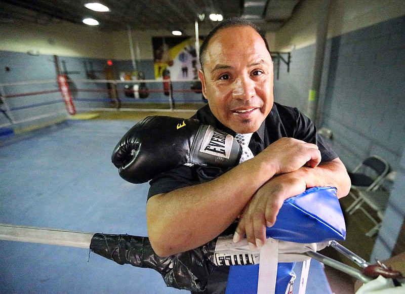 Former professional boxer Fernie Morales, 51, poses for a photo on Sept. 23 at San Juan boxing gym in El Paso, Texas. Morales fought his last fight 25 years ago on Sept. 21, 1991, in Indio, Calif. 
