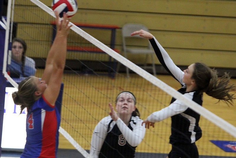 Cameron Meyer goes for a block in California's win over Southern Boone on Sept. 20.