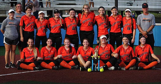 The New Bloomfield Lady Wildcats pose with the first-place trophy from the South Callaway Tournament after beating Eugene 2-1 in the championship game on Saturday. (Lydia Schuster/Contributed photo)