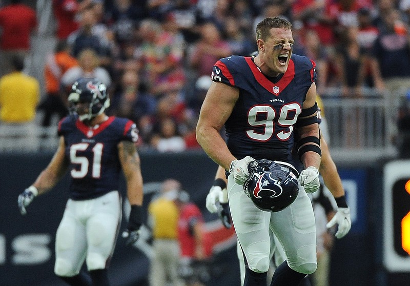 Houston Texans defensive end J.J. Watt (99) celebrates after he sacked Kansas City Chiefs quarterback Alex Smith during the first half of an NFL football game Sunday, Sept. 18, 2016, in Houston.