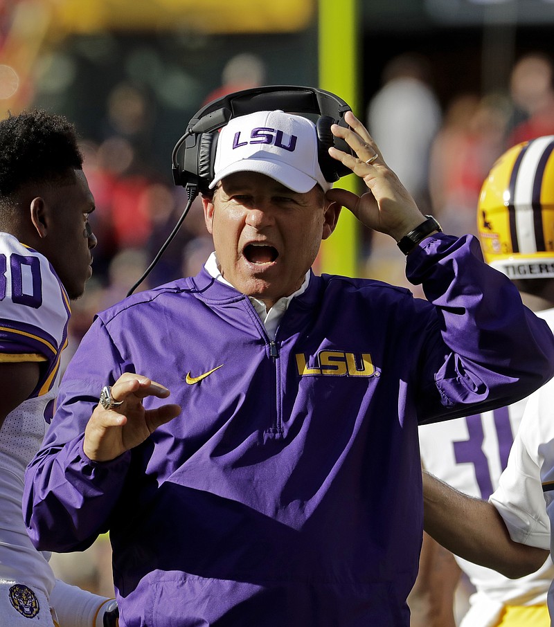 LSU head coach Les Miles yells during the second half of an NCAA college football game against Wisconsin Saturday, Sept. 3, 2016, in Green Bay, Wis. 