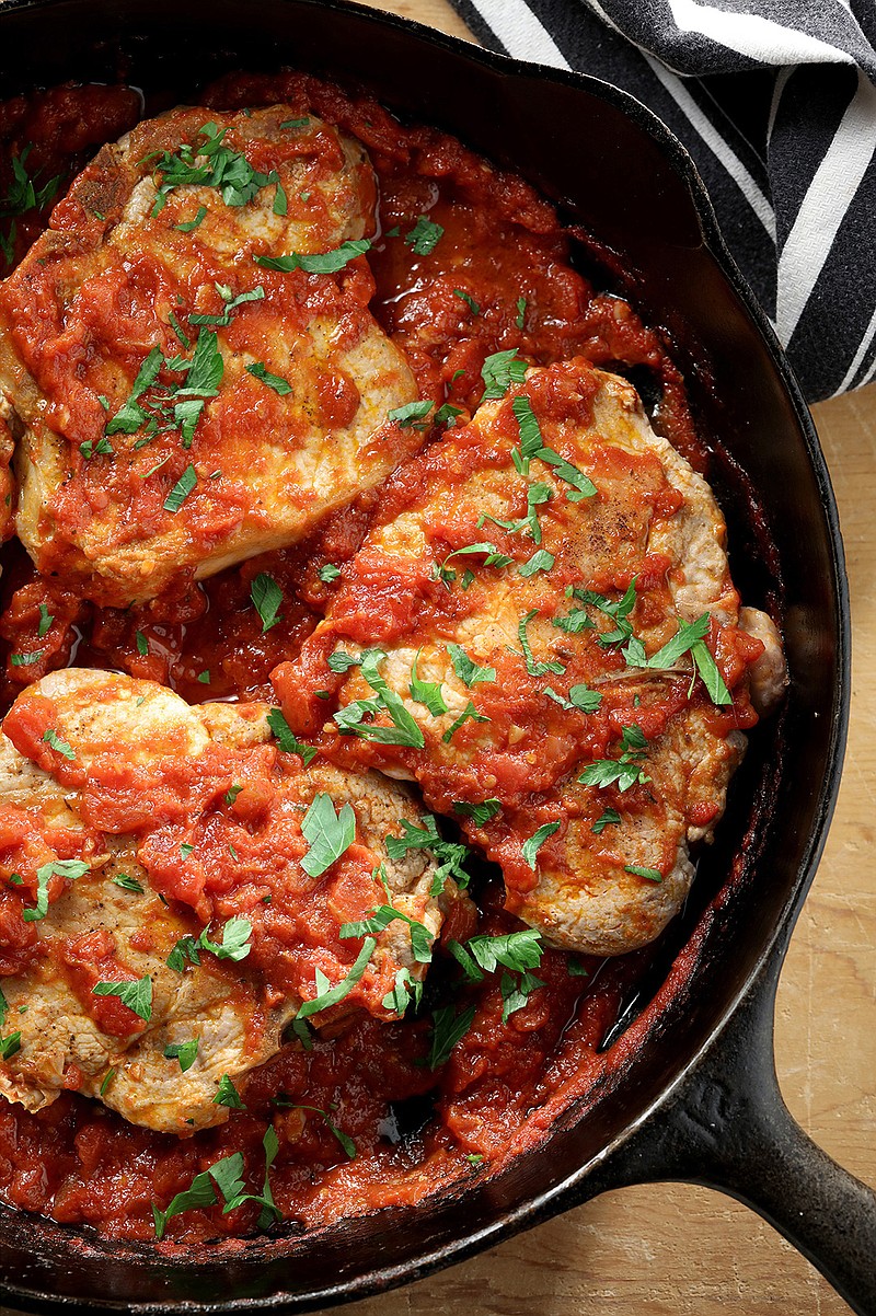 In the pork chops, pizza-maker's style from Michele Scicolone (aka braciole alla pizzaiola) the sauce has a vibrancy from the tomatoes, which plays nicely off the pork. But it also picks up the juices from the pork, adding a savory depth to each bite. 