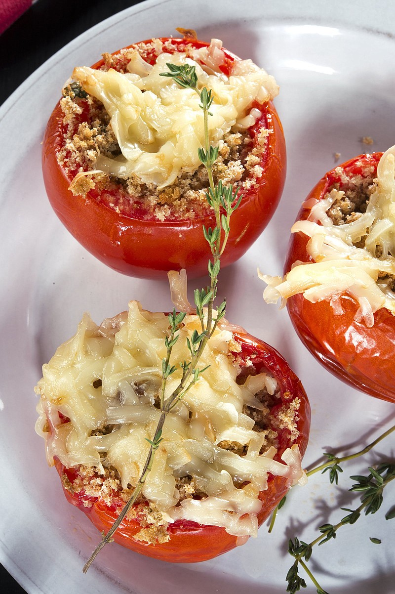Tomatoes Provencal is an ideal use for end-of-summer tomatoes. The whole-wheat breadcrumb stuffing is flavored with garlic, fresh basil and thyme and stuffed into a ripe, juicy tomato. 