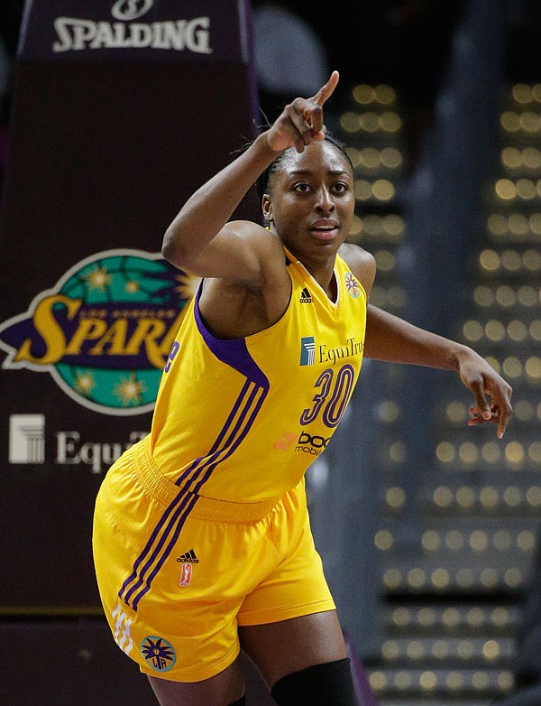 In this Sept. 3, 2015, file photo, Sparks forward Nneka Ogwumike reacts after making a basket during the first half of a game against the Mystics in Los Angeles. Ogwumike was named the WNBA MVP.